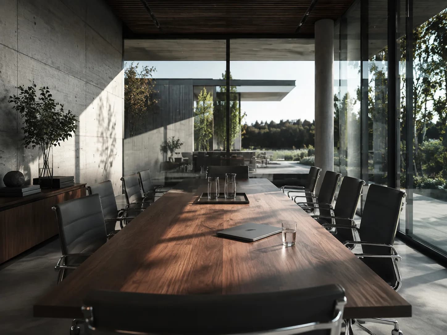 Refined boardroom with a walnut table and natural light